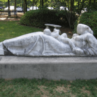 Reclining Mother and Child in front of the Roswell Library<br/> By Steffen Thomas, c. 1960 (Given in 1972) Reclining Mother and Child