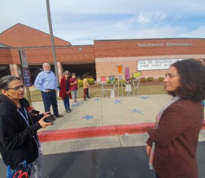 Ribbon cutting. "Unity" by Nathan Pierce. Located at Northwood Elementary.  Sponsored by Northwood Foundation.